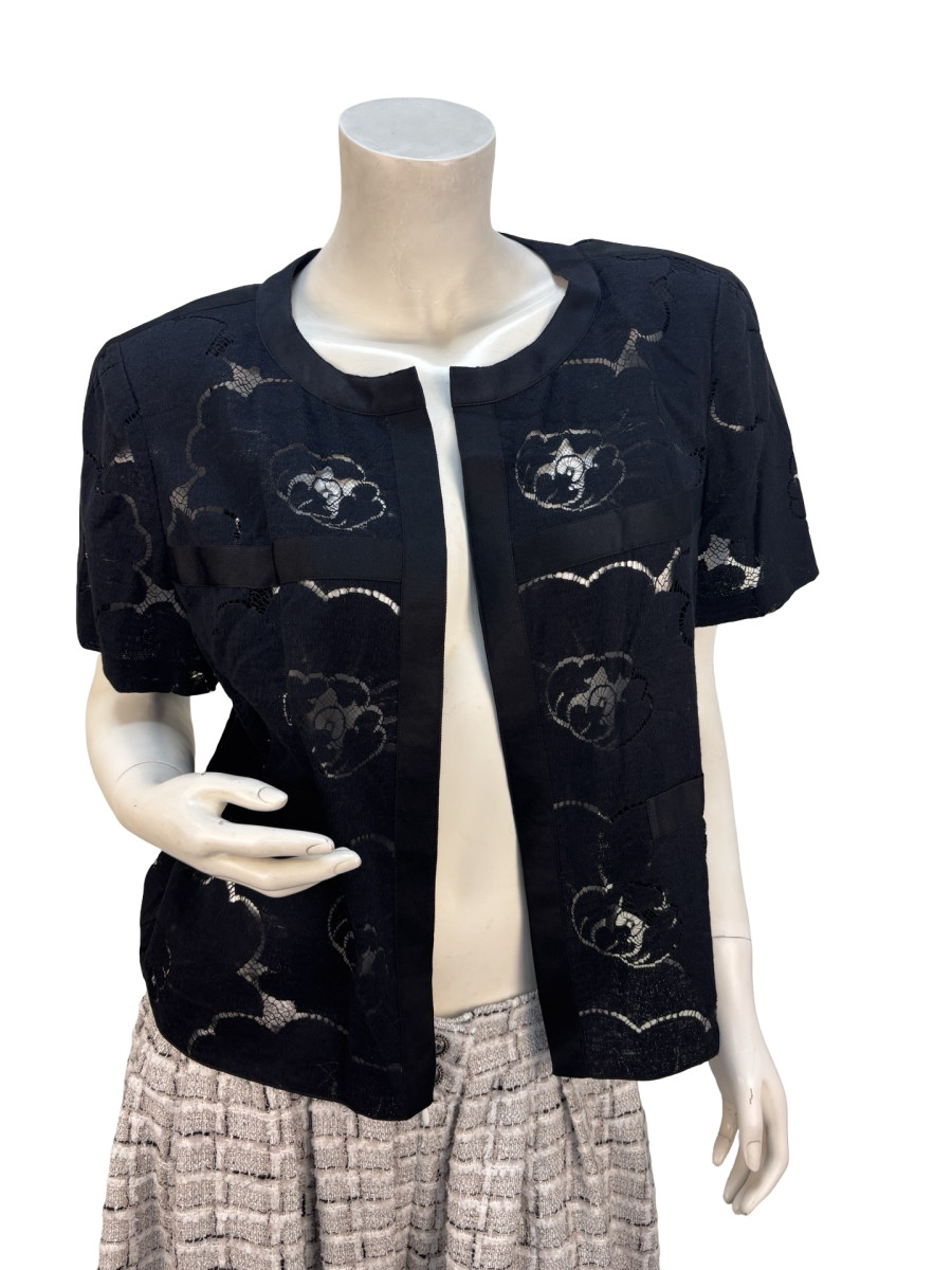 CHANEL Floral Crocheted Cardigan in Black