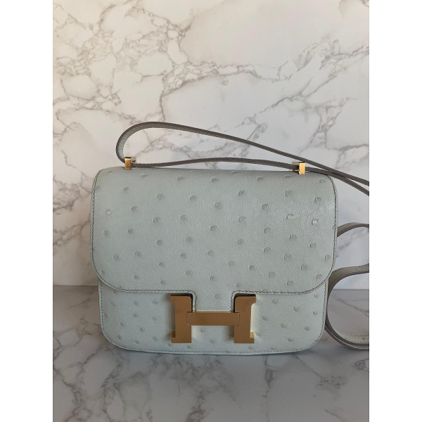 Rent Buy HERMES Mini 18cm Constance Beton Ostrich With Gold MY WARDROBE HQ