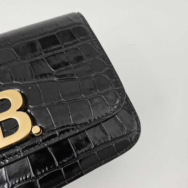 Balenciaga B Small Embossed Crossbody Bag in Black