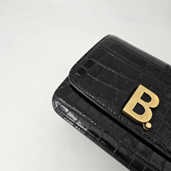 Balenciaga B Small Embossed Crossbody Bag in Black