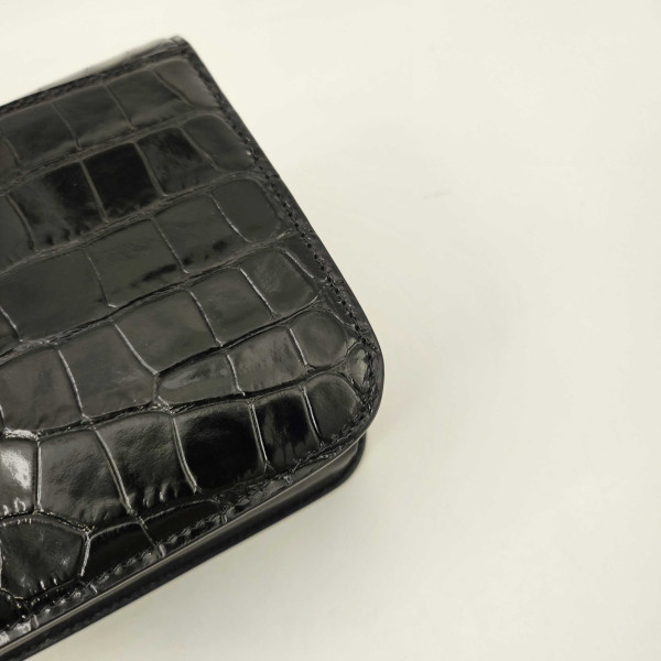 Balenciaga B Small Embossed Crossbody Bag in Black